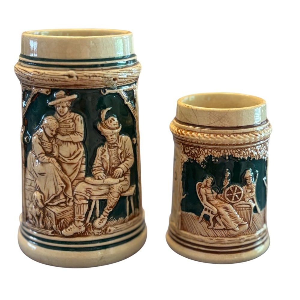 Two enameled beer steins made in Germany